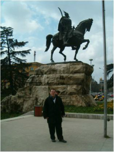 Genard Hajdini at the Skanderbeg Monument in Tirana